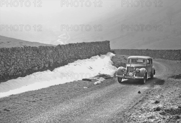 1953 Alvis TA21 during 1954 R.A.C. Rally. Creator: Unknown.