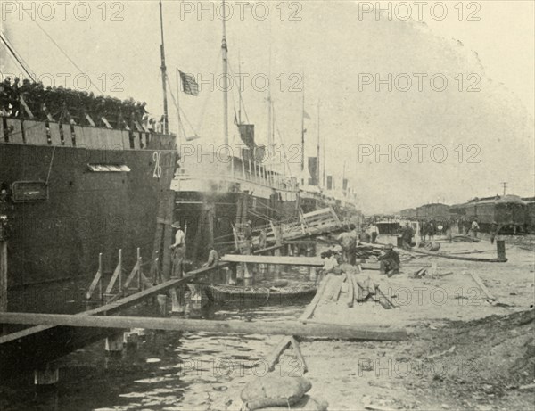 'At the Dock, June 10th', Spanish-American War, 1898, (1899). Creator: Burr McIntosh.