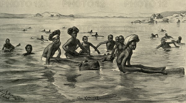 Men in the River Nile at the First Cataract, Egypt, 1898.  Creator: Christian Wilhelm Allers.