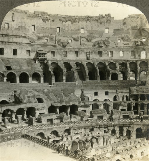 'Stupendous interior of the Colosseum, with dens of wild beasts, Rome', c1909. Creator: Unknown.