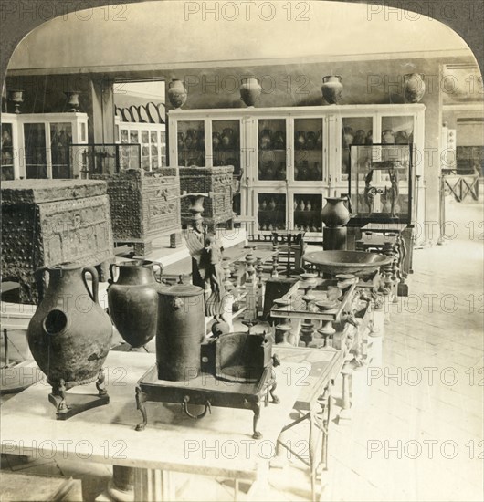 'Stove and money chests found at Pompeii, National Museum, Naples, Italy', c1909. Creator: Unknown.