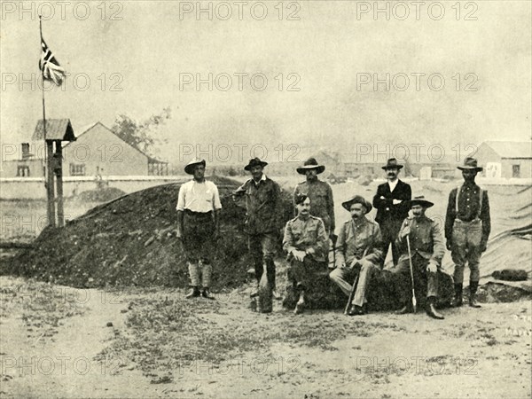 'General Baden-Powell, Lord Edward Cecil, and Other Officers, at the Entrance to their "Dug-Out".',  Creator: D Taylor.