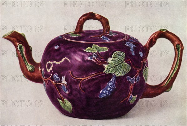 Staffordshire teapot decorated with applied reliefs, c1755, (1944).  Creator: Unknown.
