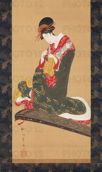 Woman Putting on Finger Plectrums to Play the Koto, early 19th century. Creator: Utagawa Toyohiro.