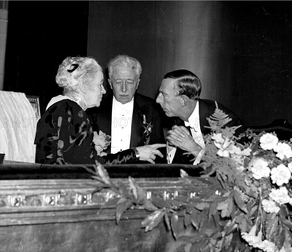 Selma Lagerlof with princes Eugen and Wilhelm, for her 80th birthday, the Dramaten, 1938. Creator: Unknown.