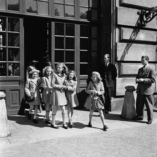 Princesses Birgitta, Margaretha and Desiree on their way from the Castle School, 24/5 1946. Creator: Unknown.