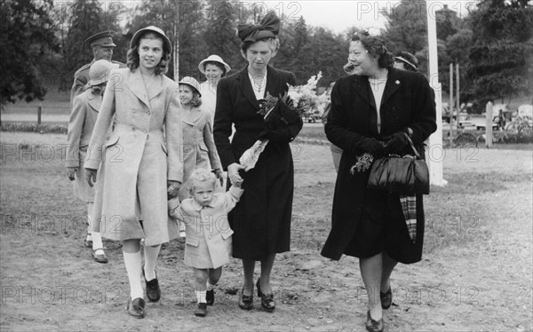 Crown Prince Carl Gustav with mother Sibylla and big sister Margaretha, Stockholm, 1947.  Creator: Unknown.