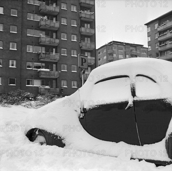 Car covered in snow, Stockholm, January 1954. Creator: Unknown.