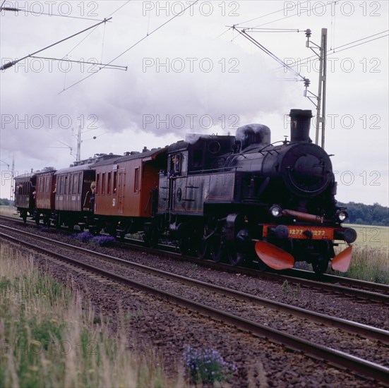 Steam locomotive 1277 and passenger cars, museum railway, Sweden, 1960s. Creator: Unknown.