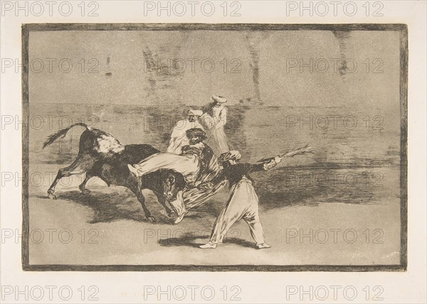 Plate 8 from the 'Tauromaquia':A Moor Caught by the Bull in the ring., 1816. Creator: Francisco Goya.