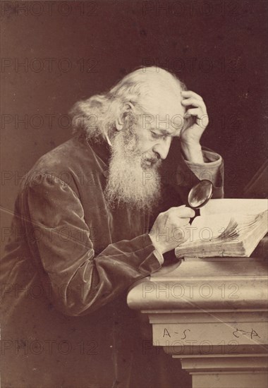 [Bearded Man with Magnifying Glass Examining a Manuscript], 1870s.