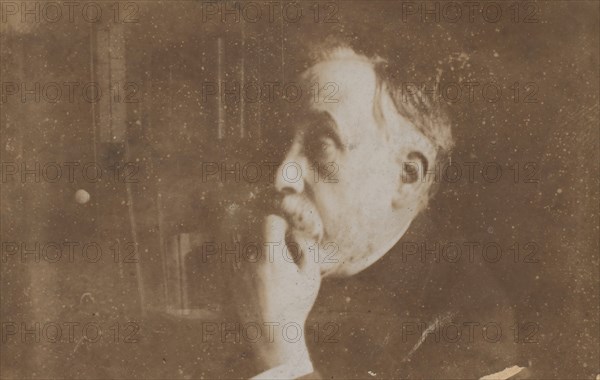 [Self-Portrait in Library (Hand to Chin)], probably 1895.