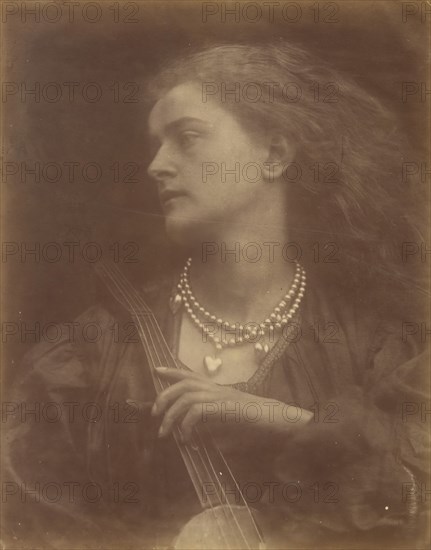 And Enid Sang, September 1874. A woman (Emily Peacock) wears two strands of pearls and holds a stringed instrument. A photographic illustration to Alfred Tennyson's "Idylls of the King"; a series of narrative poems based on the legends of King Arthur.
