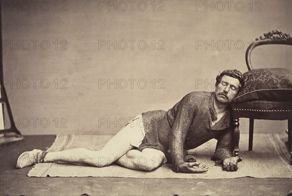 [Man in Chainmail Tunic Posing as a Dying Soldier], ca. 1863.