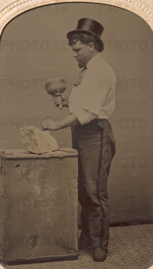 Mason in Top Hat with Mallet, Chisel, and Piece of Stone, 1870s-80s.