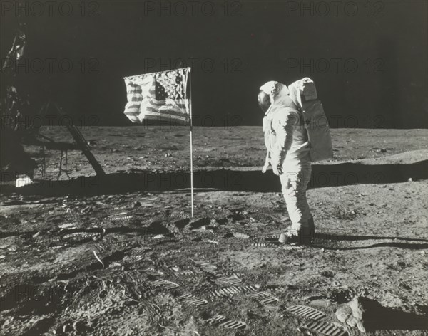 Buzz Aldrin on the Moon with the American Flag, 1969.