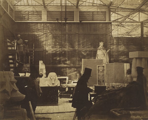 [Storeroom with Artisans and Plaster Casts, Crystal Palace], 1852.