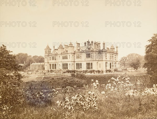 Garscube House, Scotland, 1860s-70s. The house was designed by William Burn in the style of an old English manor and built on the bank of the River Kelvin in 1827 to replace an earlier mansion. The University of Glasgow purchased Garscube House and the estate in 1948. The house was demolished in 1954 and Wolfson Hall of Residence was erected on the site in 1965. A veterinary hospital was established on the estate in 1957 and a veterinary school in 1970.