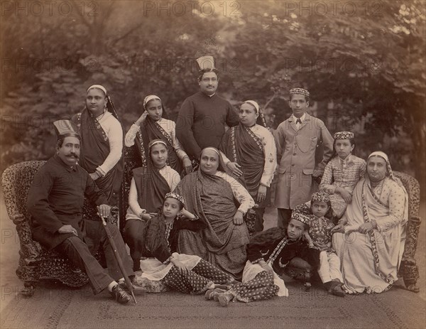 Formal Family Portrait of Thirteen People, Men in European Dress, 1860s-70s.