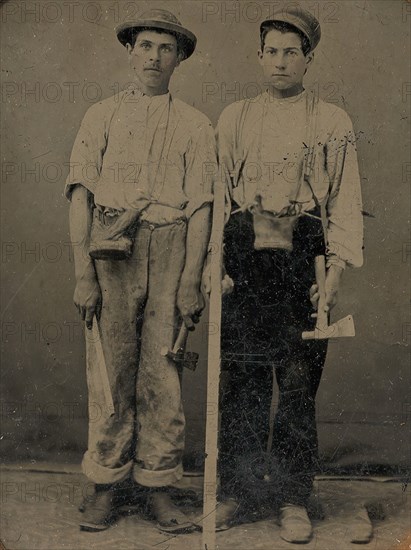 Two Young Workmen with Hatchets, 1860s-70s.