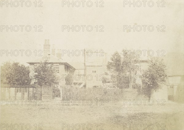 Compound of Buildings Surrounded By Fence, 1850s.