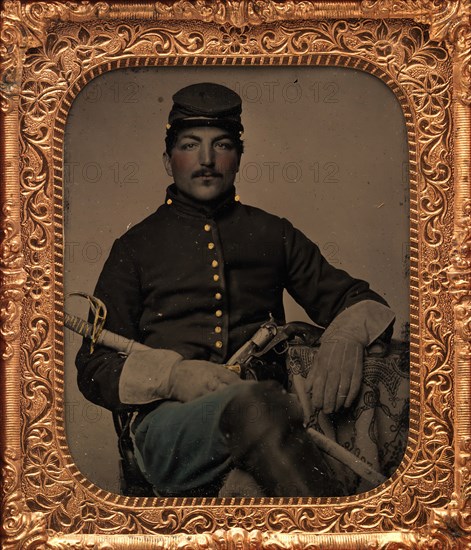 Union Cavalry Soldier, Seated, with Sword and Handgun, 1861-65.