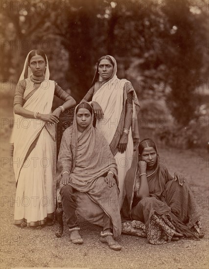 Four Hindu Women, One Seated in a Chair, Outdoors, 1860s-70s.