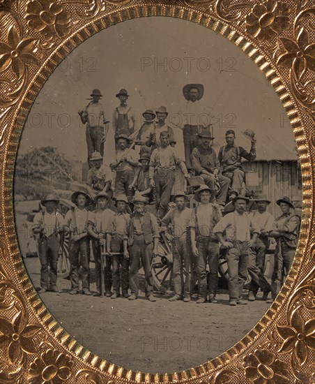 Crew of Twenty-one Workmen Posing With Tools Outdoors, 1860s-80s.