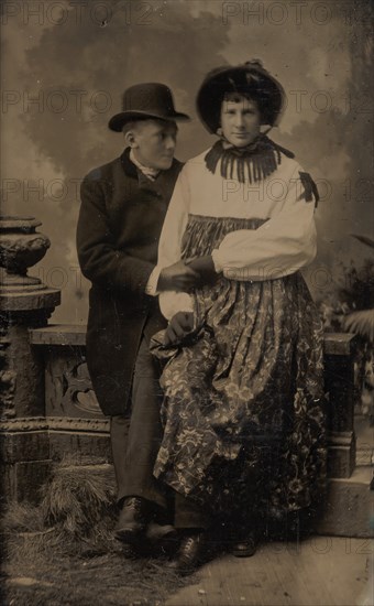 Two Men, One Dressed in Women's Attire, Holding Hands, 1870s-80s.