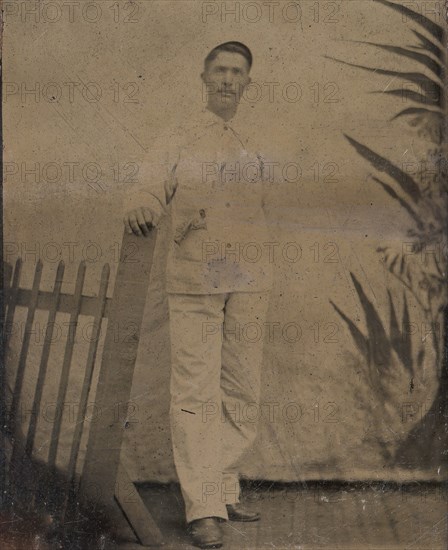 Painter Resting His Hand on Picket Fence, 1860s-80s.