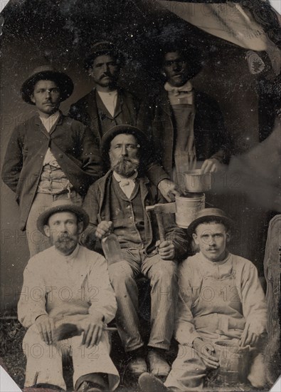 Six Workmen Holding Various Trade Tools: Paint Brushes, Bucket, Glass Bottle, and Hatchet, 1860s-70s.