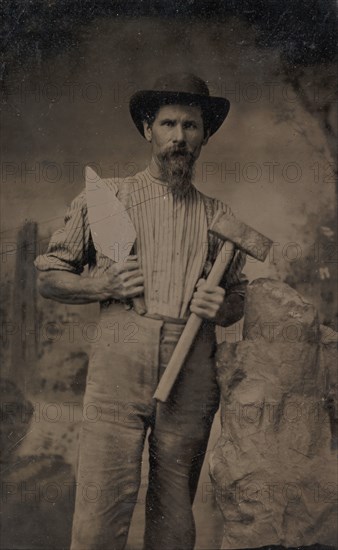 Mason (?) Holding a Trowel and Sledgehammer, 1870s-80s.