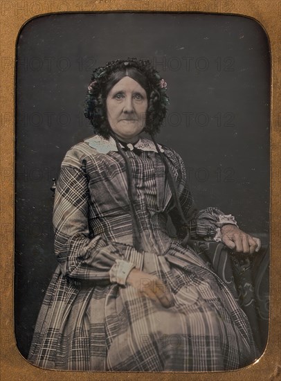 Seated Elderly Woman Wearing Plaid Dress and Bonnet, 1854-60.