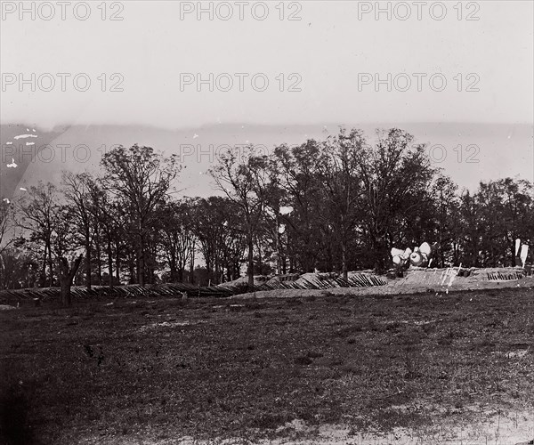 [Earthworks at the edge of a forest]. Brady album, p. 132, 1861-65. Formerly attributed to Mathew B. Brady.