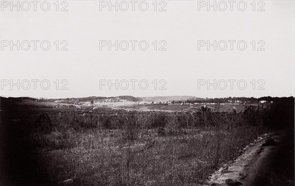 [Landscape with army encampment in the distance]. Brady album, p. 125, 1861-65. Formerly attributed to Mathew B. Brady.