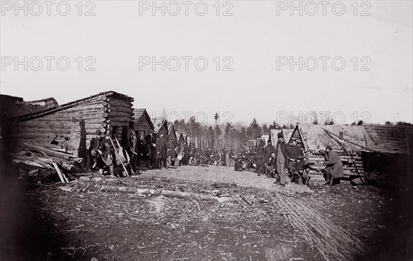 [Winter Quarters, troops with row of cabins]. Brady album, p. 128, 1861-65. Formerly attributed to Mathew B. Brady.