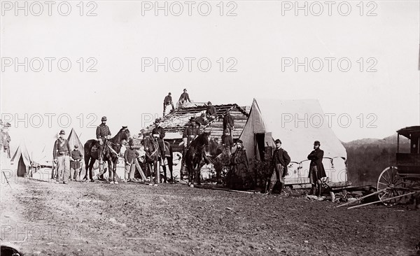 Building Winter Quarters, 1861-65. Formerly attributed to Mathew B. Brady.