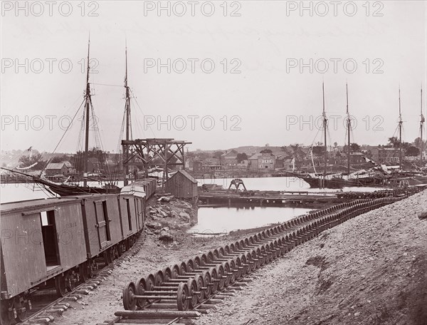 Unloading Supplies for U.S. Military Railroad opposite Richmond, Virginia, ca. 1865. Formerly attributed to Mathew B. Brady.