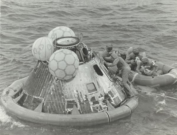 Astronauts in Lifeboat After Apollo 11 Splashdown, 1969.