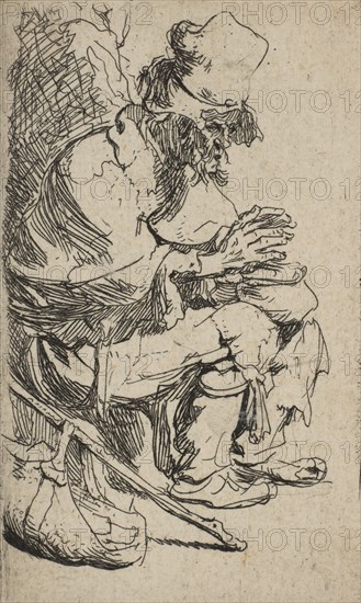 Beggar Seated Warming His Hands at a Chafing Dish, ca. 1630., ca. 1630. Creator: Rembrandt Harmensz van Rijn.