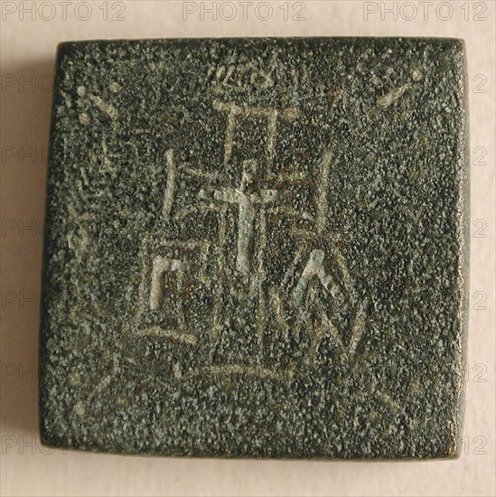 Copper-Alloy Balance Weight with a Cross in a Wreath, Byzantine, 5th-6th century.