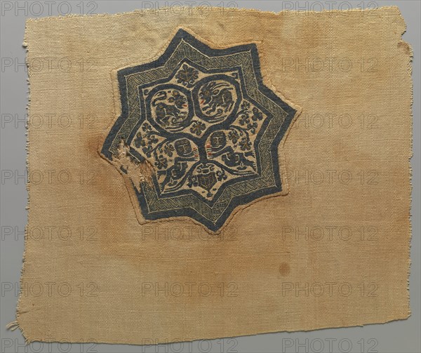 Textile Fragment with Inhabited Vine in an Eight-Pointed Star, Coptic, 5th-6th century.