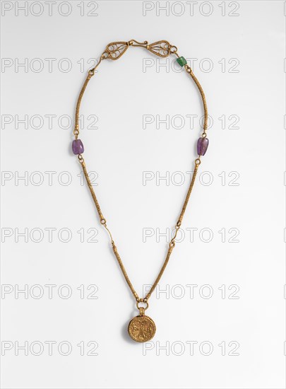 Gold Necklace with Gold Cross, Two Amethysts, and an Emerald Plasma, Byzantine, 6th-7th century.