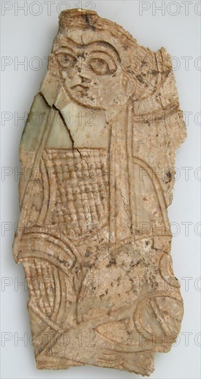 Fragment of a Plaque with a Standing Woman, Coptic, 4th century.