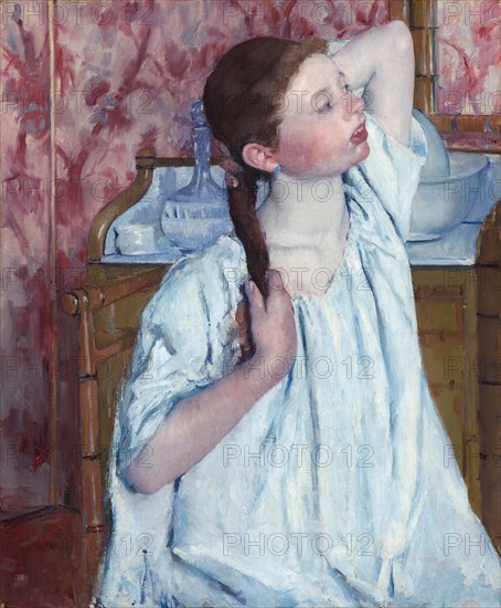 Girl Arranging Her Hair