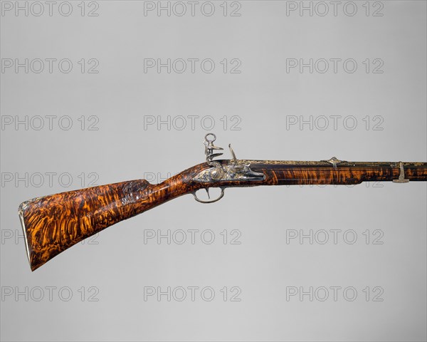 Gun with Flintlock a la moda