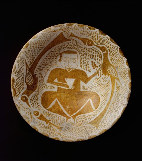 Bowl depicting a Man holding a Cup and a Flowering Branch