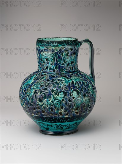 Pierced Jug with Harpies and Sphinxes, Iran, dated A.H. 612/ A.D. 1215-16. Verses around the rim were written by the poet Rukn al-Din Qummi,