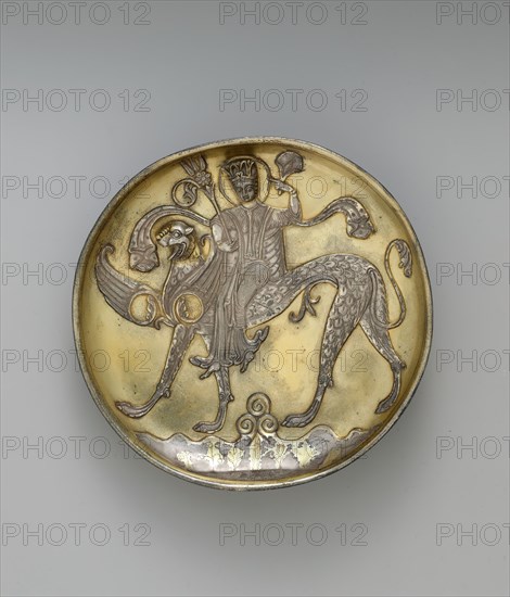 Plate Depicting a Female Figure Riding a Fantastic Winged Beast, Iran, probably 8th century.