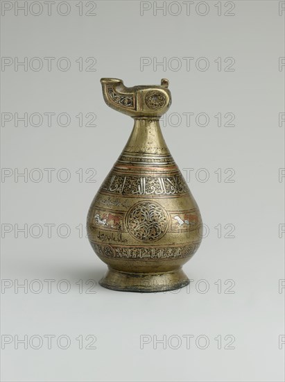 Ewer with Lamp-Shaped Spout, Iran, 12th century. Arabic inscriptions of good wishes to the owner.